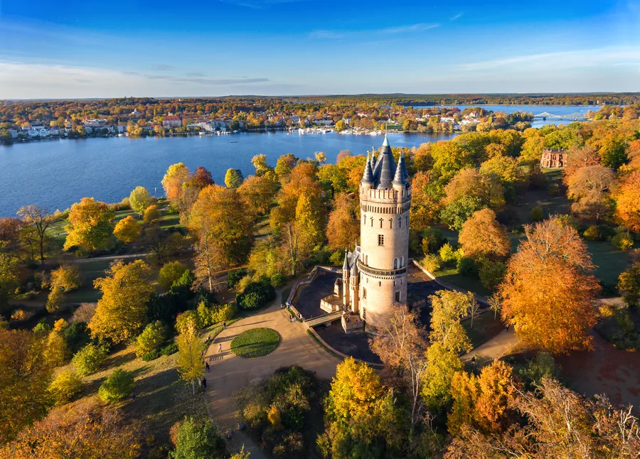 Flatow Tower above the autumn parkland and lakes of Babelsberg